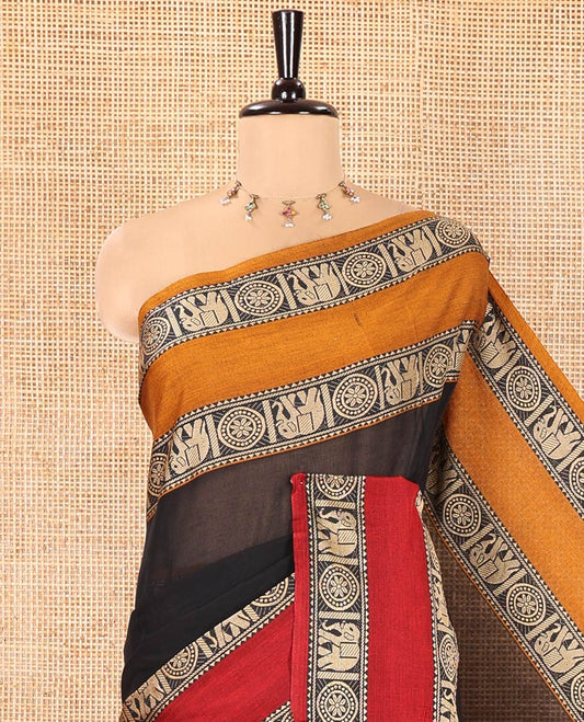 Black Plain Mercerised Cotton Saree, Complemented by a Contrast Ganga-Jamuna Rettai Pettu Thread Border of Temple, Elephant, and Chakram Designs, Subtly Striped Pallu, and Paired with a Matching Blouse