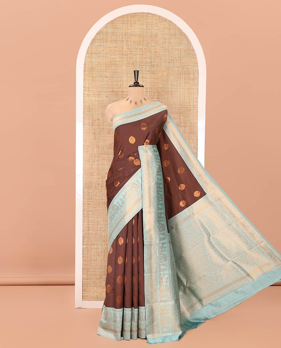 Brown-Green Kanchi Silk Saree, Accentuated with Zari Buttas All Over Its Body, Complemented by Contrast Traditional Zari Border of Wedding Theme Motifs, Grand Pallu and Paired with a Contrast Blouse