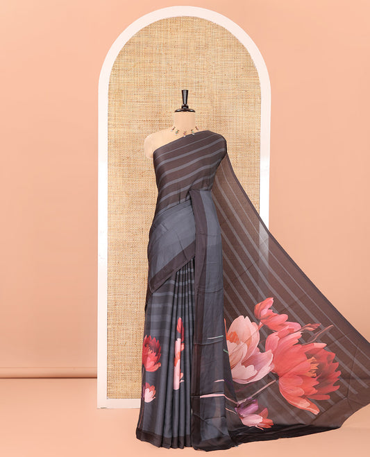 Borderless Green Satin Crepe Saree, Prettified with Tulip Motifs All Over Its Body, Pallu Artfully Pictures Floral Motifs Print, and Paired with a Printed Blouse