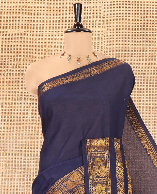Navy Blue Plain Sungudi Cotton Saree, Highlighted by Traditional Zari Border of Peacock and Floral Creeper Designs, Subtly Striped Pallu, and Paired with a Contrast Blouse
