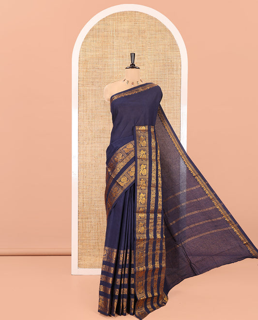 Navy Blue Plain Sungudi Cotton Saree, Highlighted by Traditional Zari Border of Peacock and Floral Creeper Designs, Subtly Striped Pallu, and Paired with a Contrast Blouse