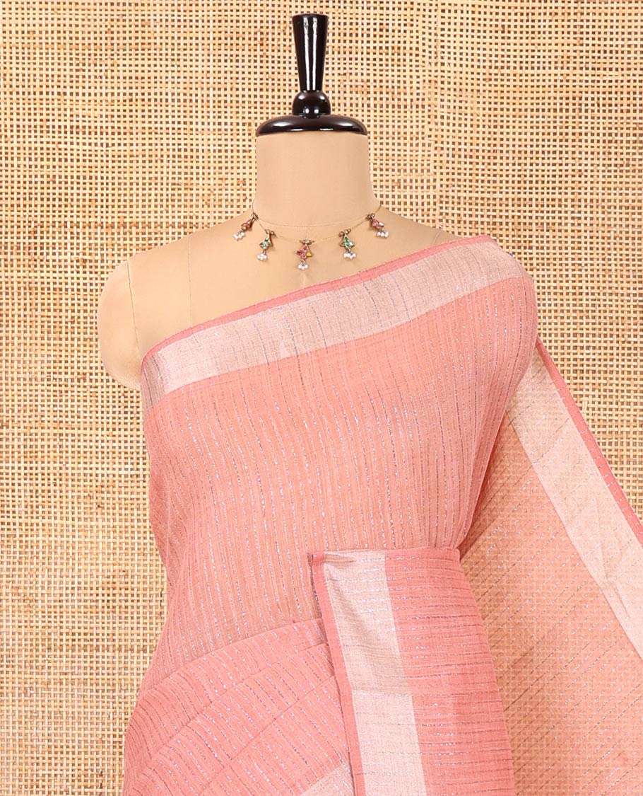 Peach Linen Zari Cotton Saree, Gleamed Up with Zari Stripes All Over Its Body, a Subtle Zari Border, a Self-Pallu, and Comes Without a Blouse