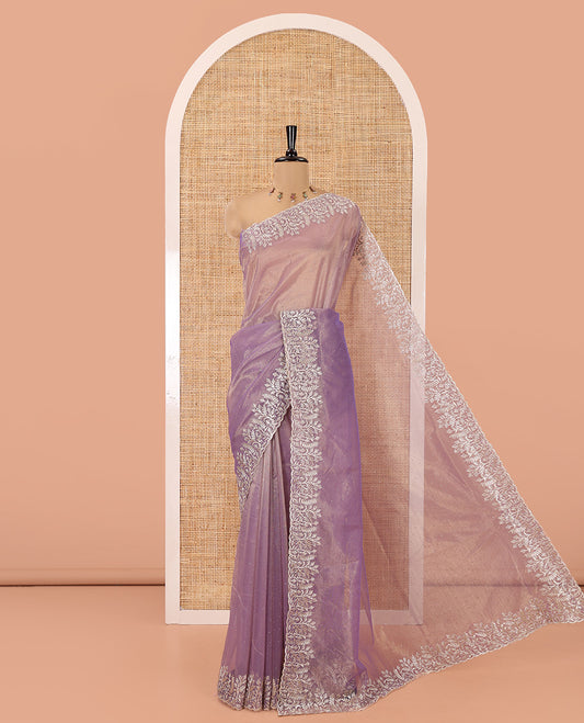 Lavender Twill Net Saree, Gleamed Up with Stone Work, Highlighted by a Scallop Embroidered Border, and Paired with a Matching Blouse