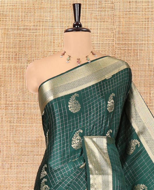 Green Satin Silk Saree, Enriched with Paisleys and Zari Checked Design on Its Body, Highlighted by Zari Traditional Design Border, Floral Jaal Pallu, and Paired with a Matching Blouse