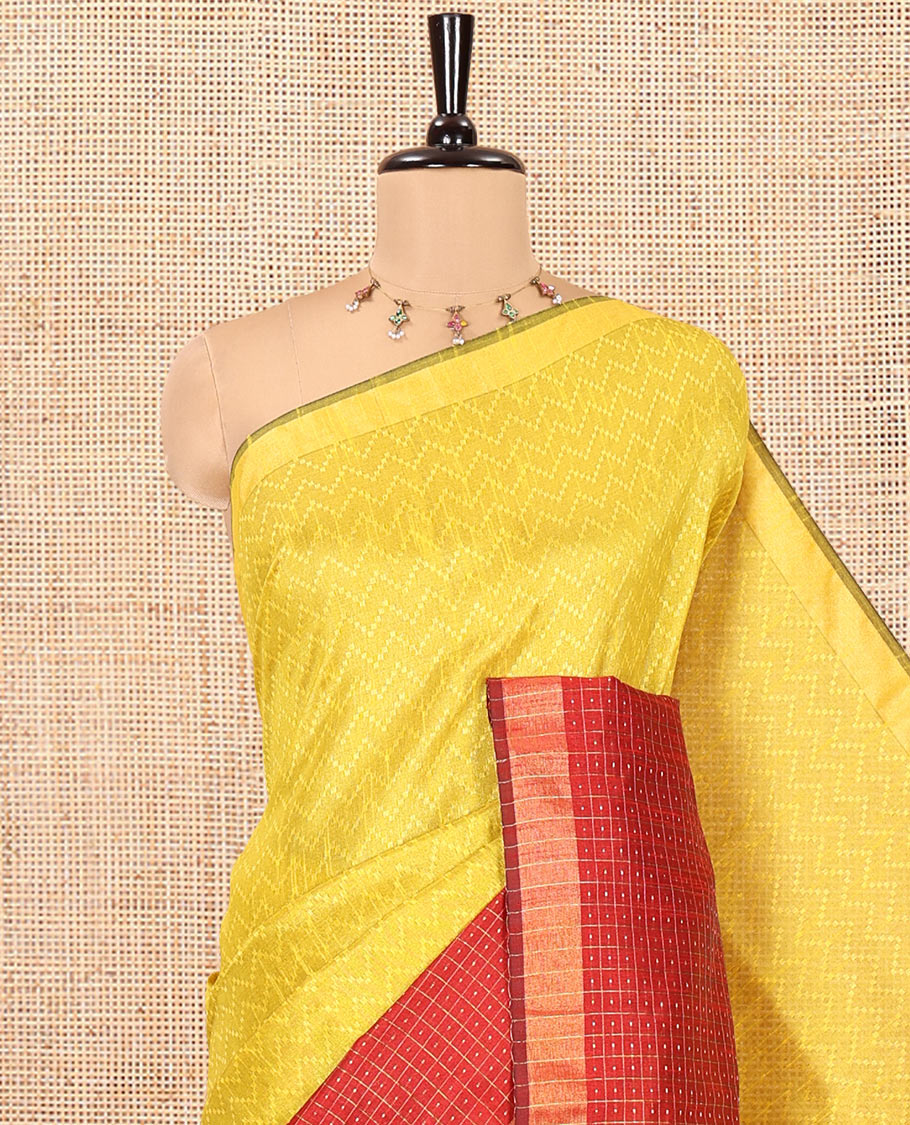 Yellow and Red Semi-Raw Silk Saree, Delicately Woven with Zig-Zag Stripes All Over Its Body, Complemented by Contrast Border of Butta Enclosed Checks, Striped Pallu, and Paired with a Contrast Blouse