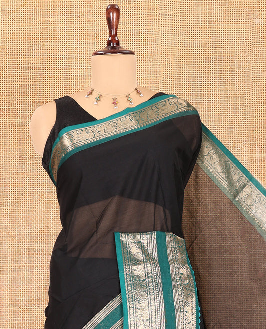 Black Plain Chettinad Cotton Saree, Complemented by a Contrast Peacock-Elephant Temple Border, Striped Pallu, and a Matching Blouse