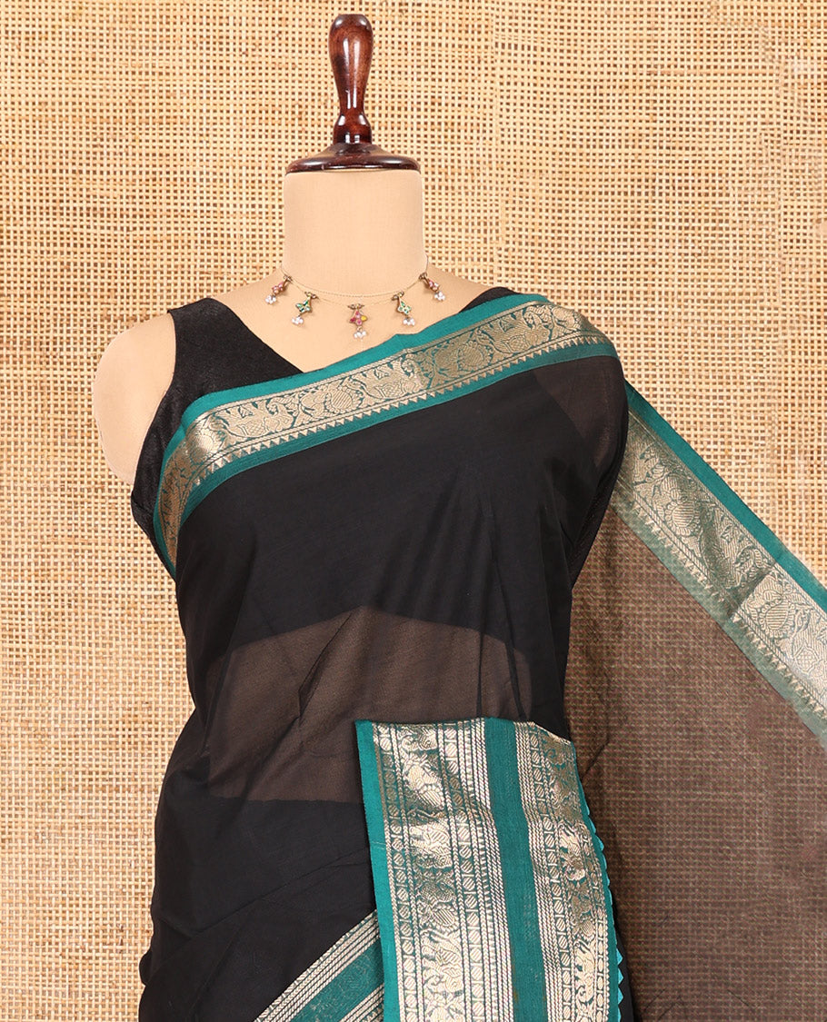 Black Plain Chettinad Cotton Saree, Complemented by a Contrast Peacock-Elephant Temple Border, Striped Pallu, and a Matching Blouse