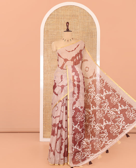 Chikku Linen Cotton Saree, Adorned with Shibori Print, Gold Piping Border, Contrast Floral Printed Pallu, and Contrast Floral Printed Blouse