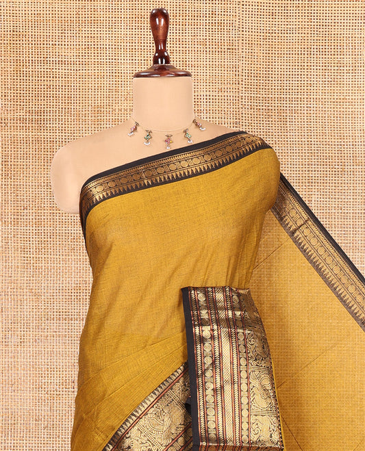 Mustard Plain Chettinad Cotton Saree, a Contrast Traditional Yaali-Elephant Zari Border, Striped Pallu, and a Matching Blouse