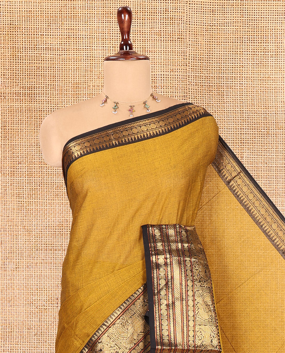 Mustard Plain Chettinad Cotton Saree, a Contrast Traditional Yaali-Elephant Zari Border, Striped Pallu, and a Matching Blouse