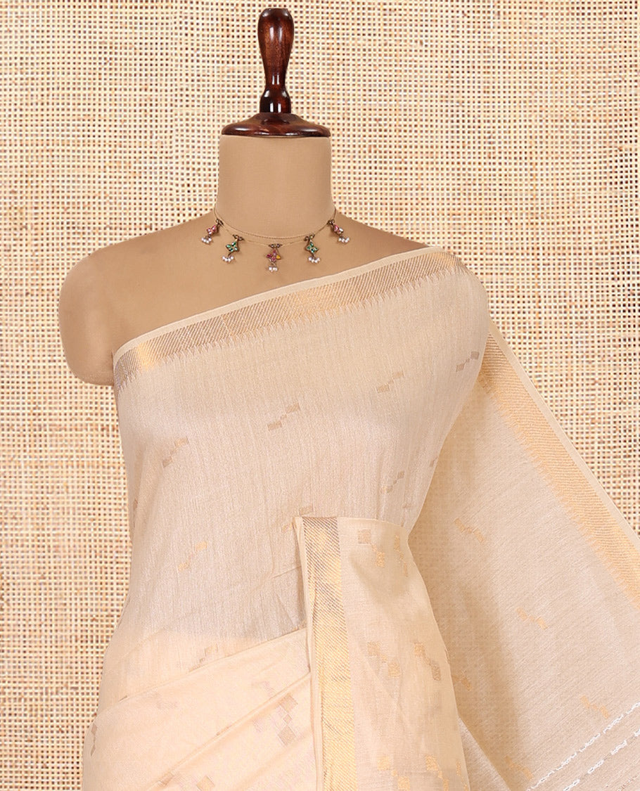 Cream Bhagalpur Cotton Saree, Adorned with Zari Buttas, a Temple Zari Border, Self-Pallu, and a Matching Blouse