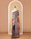 Black printed, mirror work synon silk saree with printed border, mirror work & printed pallu along with butta printed blouse