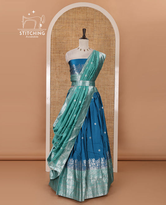 Blue-green taffeta silk half-saree, zari buttas & contrast floral-geometric zari border skirt, zari woven blouse & contrast zari woven dhavani