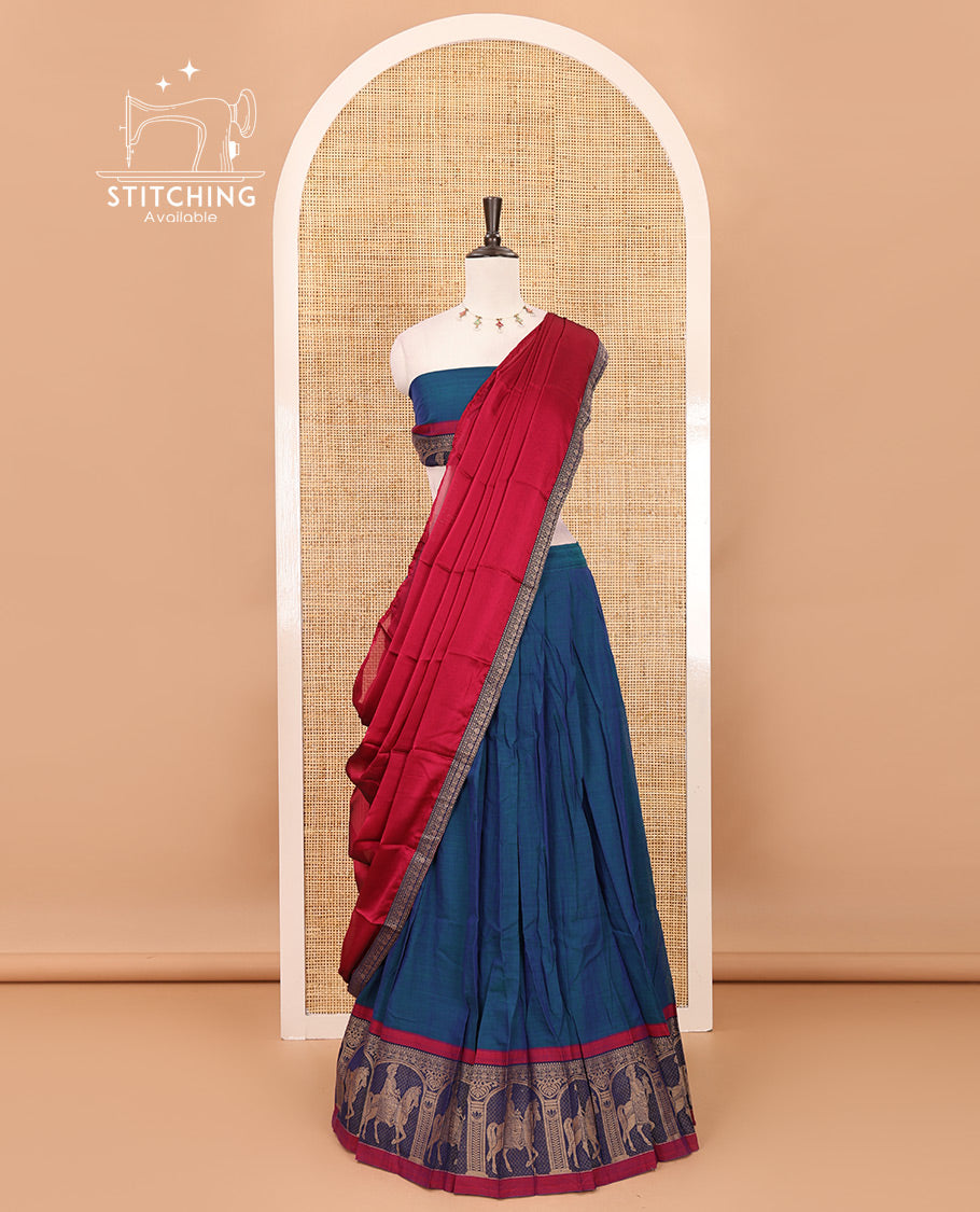 Blue with maroon mercedised cotton half-saree, contrast elephant zari border skirt, matching blouse & one side border georgette dhavani