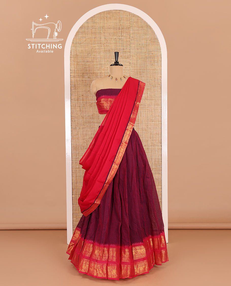 Magenta-pink sungudi cotton half-saree, plain with contrast traditional zari varisai pettu bordered skirt, a matching blouse, and a zari bordered dhavani