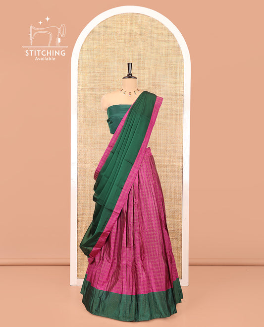 Purple and Green Checked Taffeta Silk Half-Saree, Complemented by Contrast Sparsely Striped Border, Paired with a Contrast Blouse, and Comes with Subtle-Bordered Satin Georgette Dhavani
