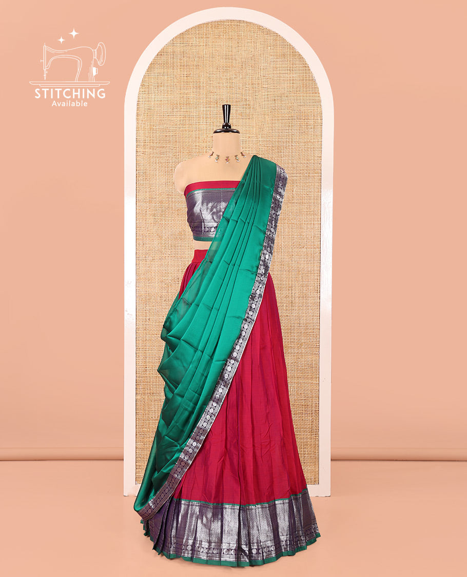 Rani Pink-Green Mercerised Cotton Half-Saree Features Plain with Contrast Traditional Zari Bordered Skirt, Paired with a Matching Blouse, and Comes with a Contrast Bordered Dhavani