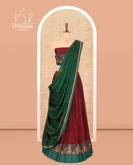 Maroon Mercerised Cotton Half-Saree Features a Plain Skirt, a Contrast Wedding-Themed Border, a Matching Blouse, a Contrast Dhavani