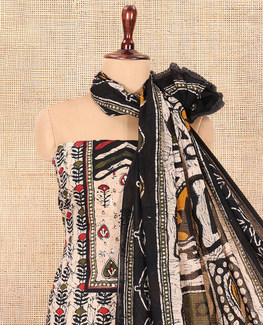 Black-Green Cotton Material Chudidar Features Batik-Printed Top, a Contrast-Printed Bottom, Batik-Printed Dupatta