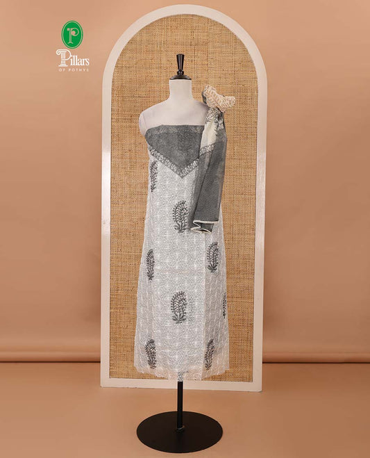 Cream-grey material chudidar set, print & chikankari-style embroidered net kota top, semi-raw silk bottom & floral print net kota dupatta