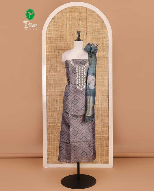 Grey and blue material chudidar set, geometric digital printed with neck embroidered Shimmer tissue top, santoon bottom, and floral printed Shimmer tissue dupatta
