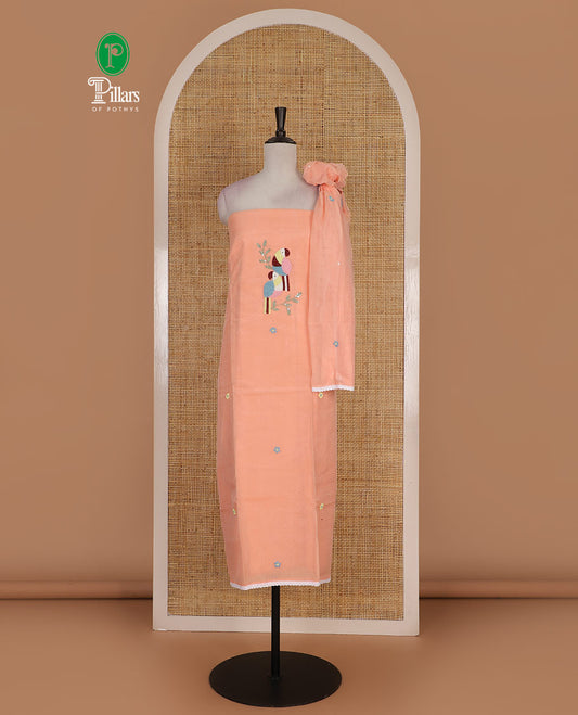 Peach net kota material chudidar set, macaw parrot, and flower motifs, multi-color sugar bead embroidered top, plain santoon bottom, and sugar bead embroidered dupatta