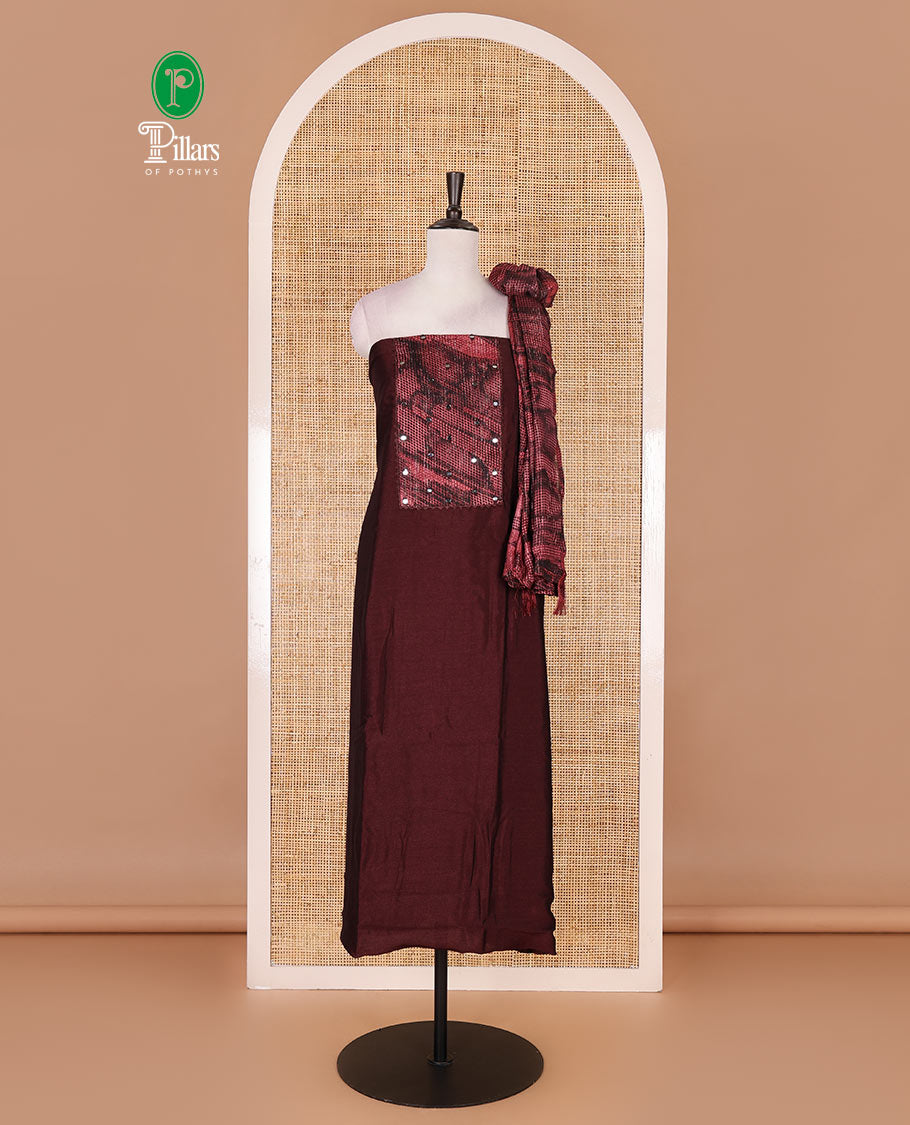 Magenta material chudidar set, abstract printed with mirrorwork vichitra silk top, santoon bottom, and abstract printed shimmer georgette dupatta