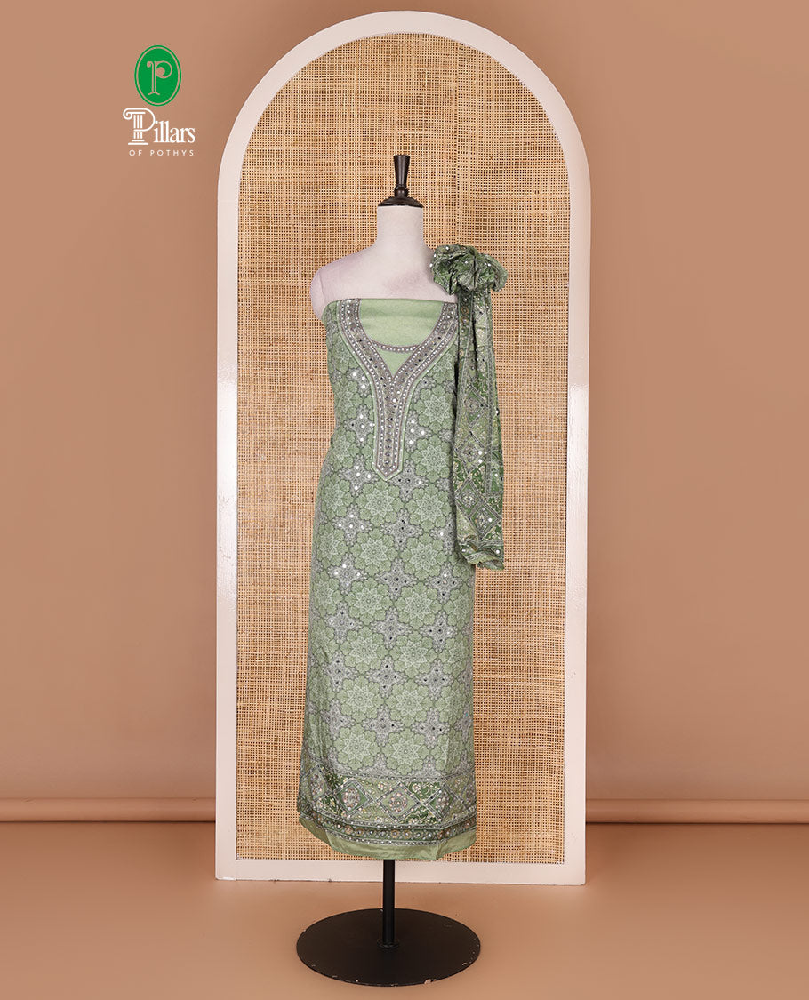 Green material chudidar set, intricately printed with original mirror work crepe top, Italian crepe bottom, and chinon digital print, mirror work dupatta