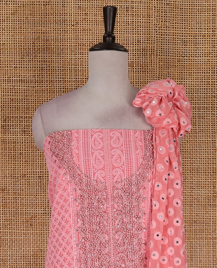 Dark peach material churidar set, stone work with Schiffli style embroidered georgette top, American Crape bottom, and polka dotted printed mirror work dupatta