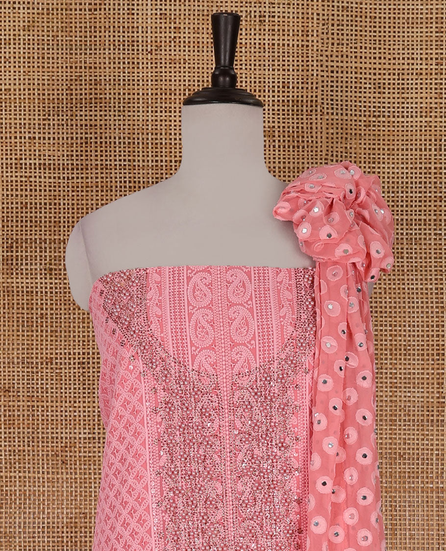 Dark peach material churidar set, stone work with Schiffli style embroidered georgette top, American Crape bottom, and polka dotted printed mirror work dupatta