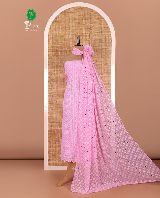 Pink material chudidar set, paisleys and jaal schiffli sequins embroidered mul georgette top, a matching bottom, and a mirror work dupatta