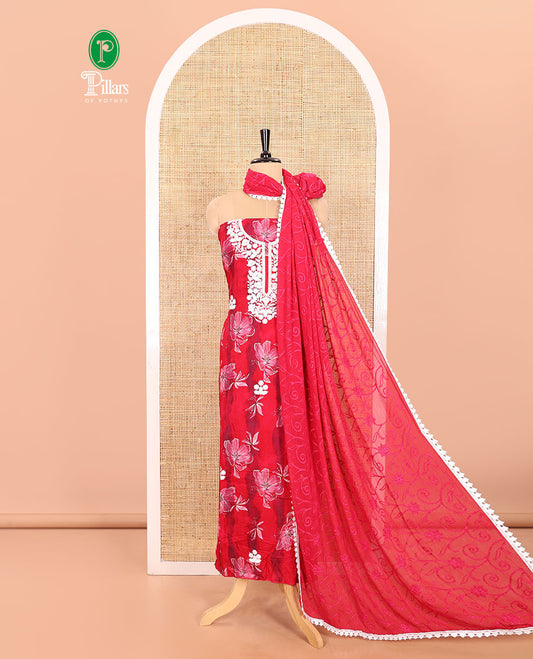 Tomato Pink Material Chudidar Set Adorned with Phulkari-Style Floral Embroidery and Floral Print Rayon Top, Subtly Made Plain Rayon Bottom, and a Chiffon Georgette Dupatta of Floral Theme Designs