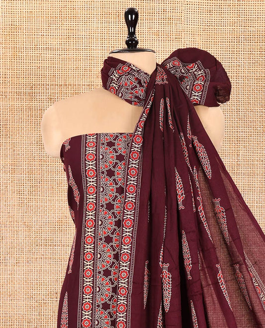 Dark Maroon Rayon Material Chudidhar Set, Elevated with Ajrakh-Style Floral Printed Top, Elegantly Printed Bottom, and Rayon Dupatta of Ajrakh-Style Floral and Tree Motifs Print