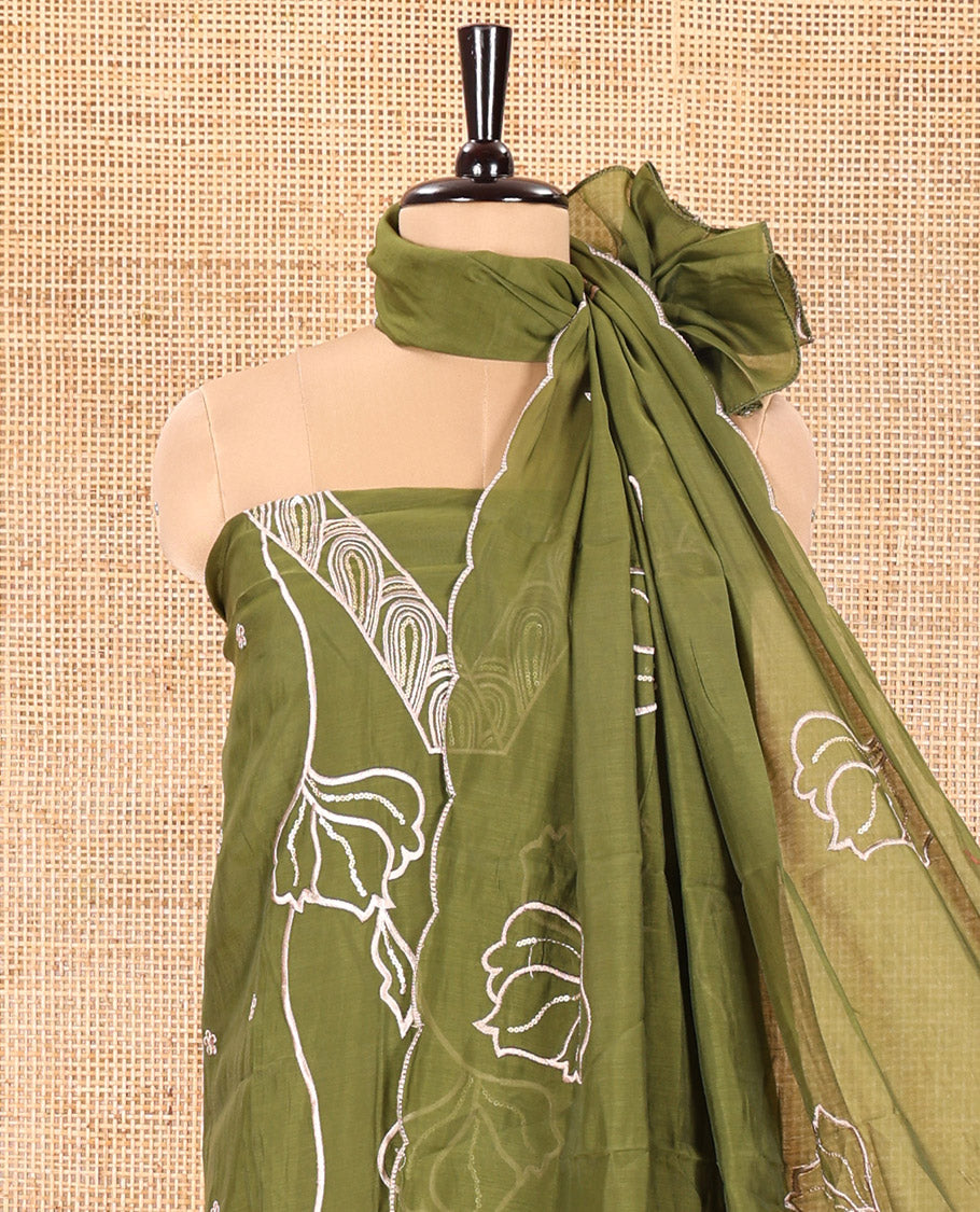 Green Mul Chanderi Material Churidar Set, Decked Up with Flower Embroidery and Sequins Work V-Neck Top, a Plain Santoon Bottom, and Paired with a Mul Chanderi Floral Embroidered Dupatta