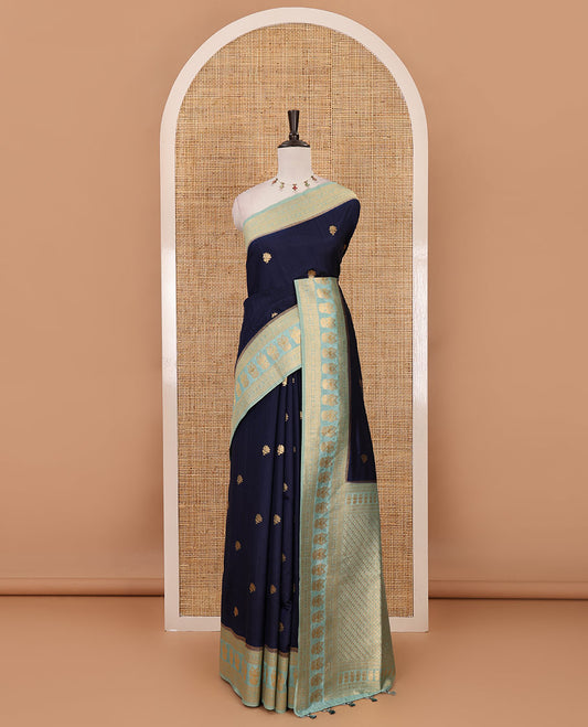 Navy blue peacock buttas dola silk saree, contrast rudraksham & iruthalai pakshi border, intricate pallu & contrast jacquard blouse