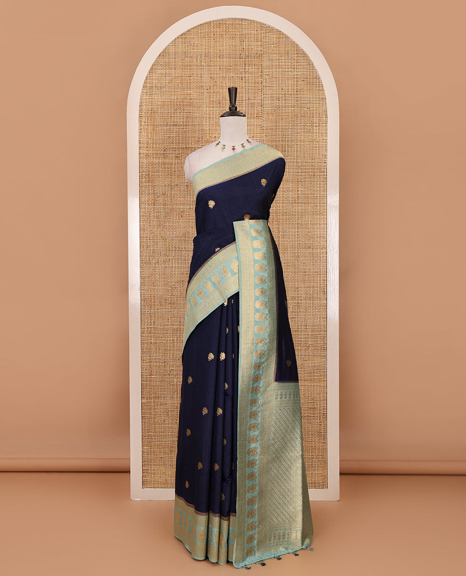 Navy blue peacock buttas dola silk saree, contrast rudraksham & iruthalai pakshi border, intricate pallu & contrast jacquard blouse