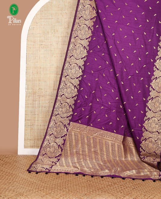 Purple zari peacock butta dola raw silk saree with kancheepuram zari border with geometrical zari pallu along with plain blouse