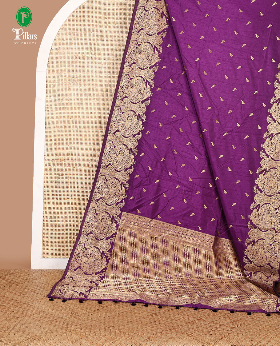 Purple zari peacock butta dola raw silk saree with kancheepuram zari border with geometrical zari pallu along with plain blouse