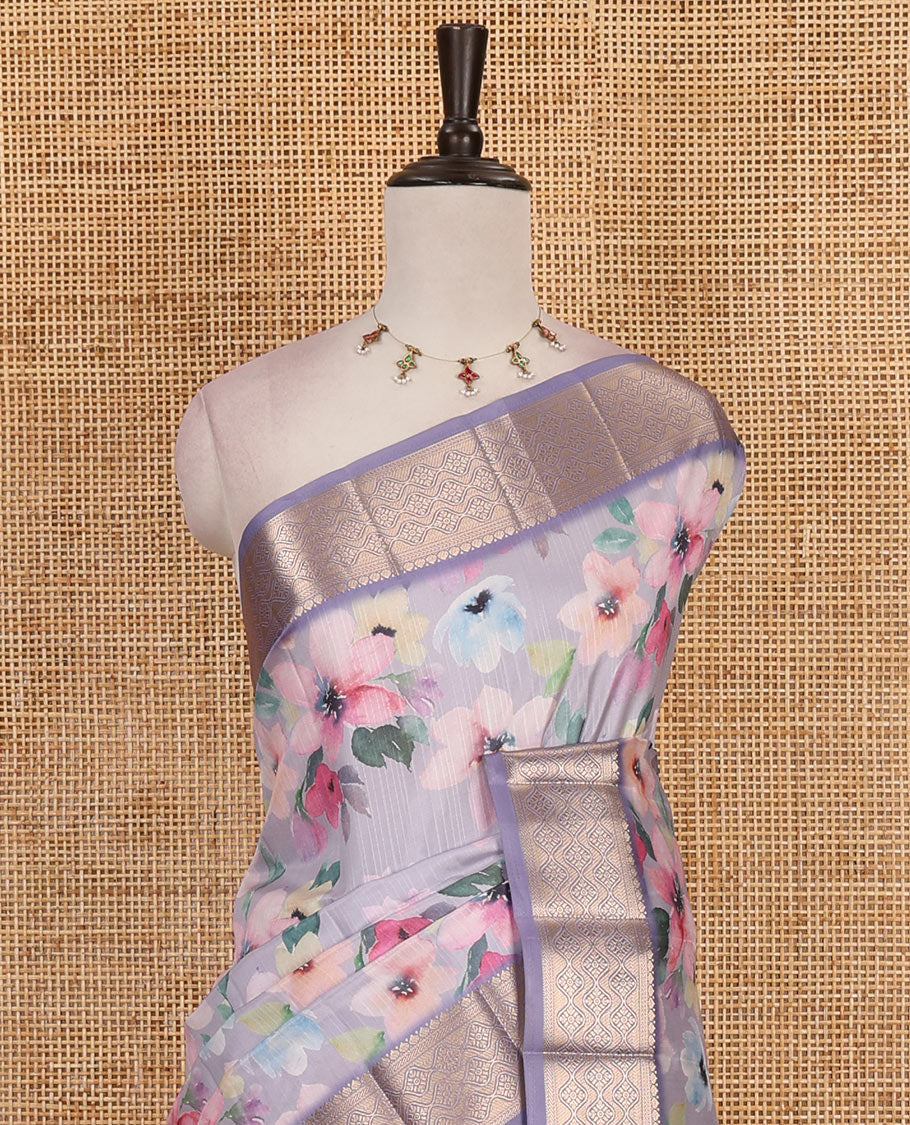 Lavender colorful unique shaped floral printed fancy tussar saree, contrast ogee patterned zari border, and intricate pallu