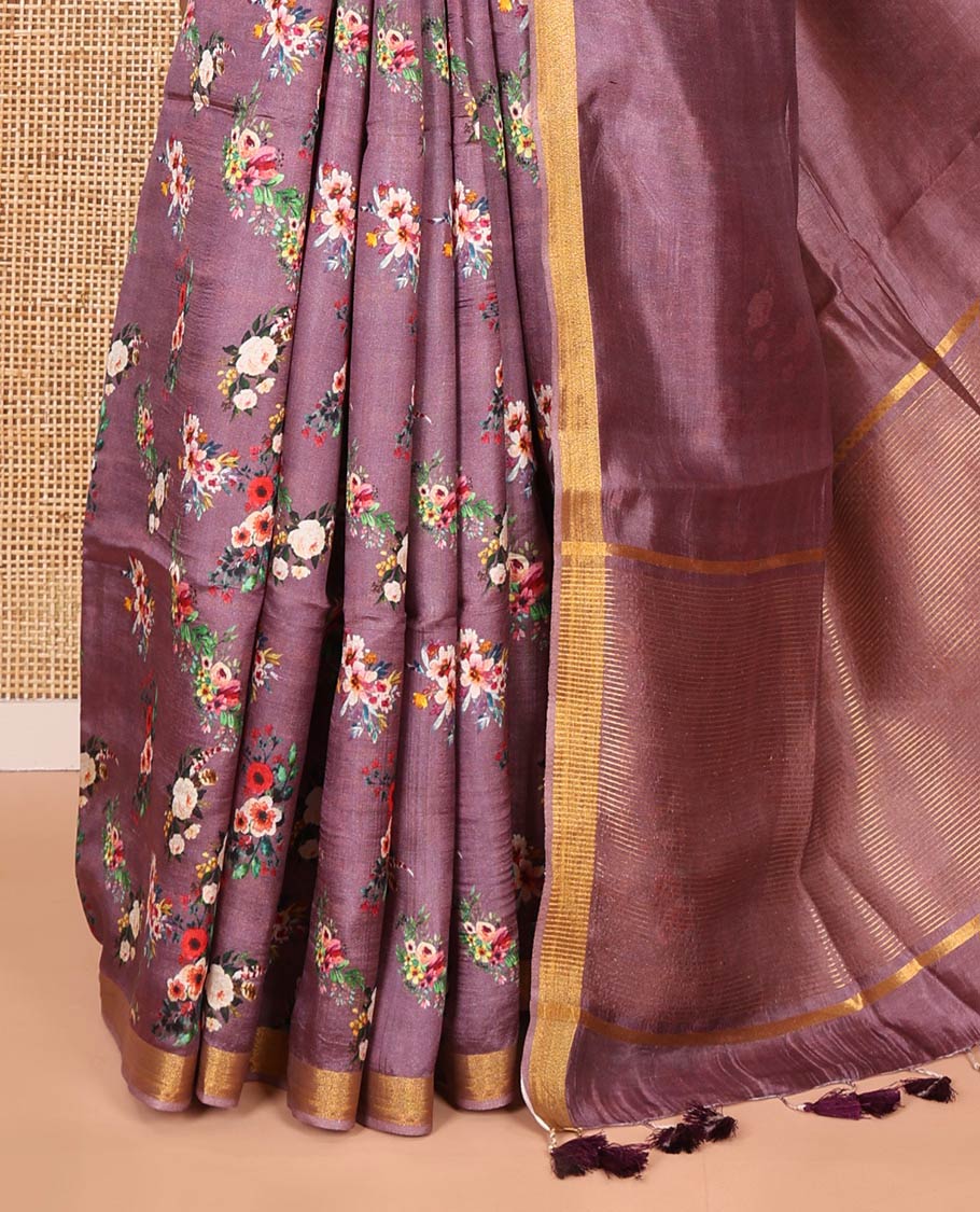 Grape-color colorful floral bunches printed banana pith saree, piping zari border, striped pallu, and a printed blouse