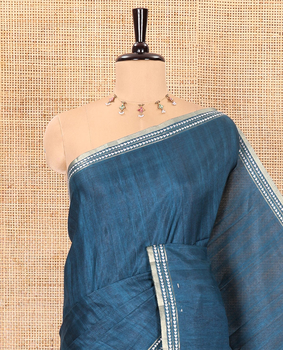 Peacock blue plain fancy tussar saree, temple motifs woven thread border, striped pallu, and a matching blouse