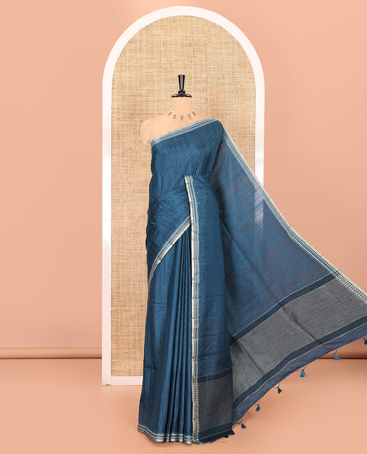 Peacock blue plain fancy tussar saree, temple motifs woven thread border, striped pallu, and a matching blouse