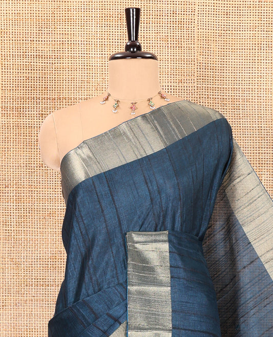 Peacock blue plain ghicha woven fancy tussar silk saree, tissue small border, striped pallu, and a matching blouse