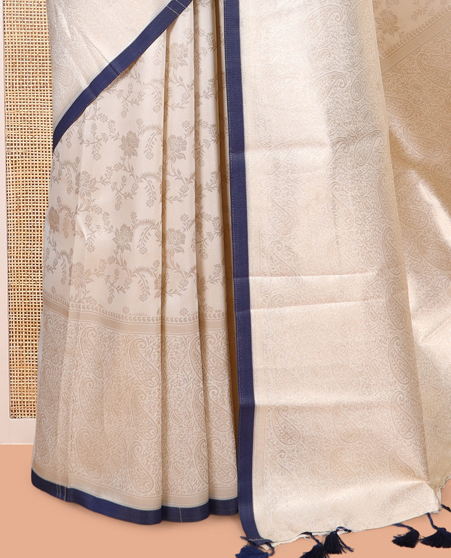 Off-White-Navy Semi-Silk Saree, Adorned with Floral Jacquard Design, a Zari Paisley Border, and a Contrast Blouse