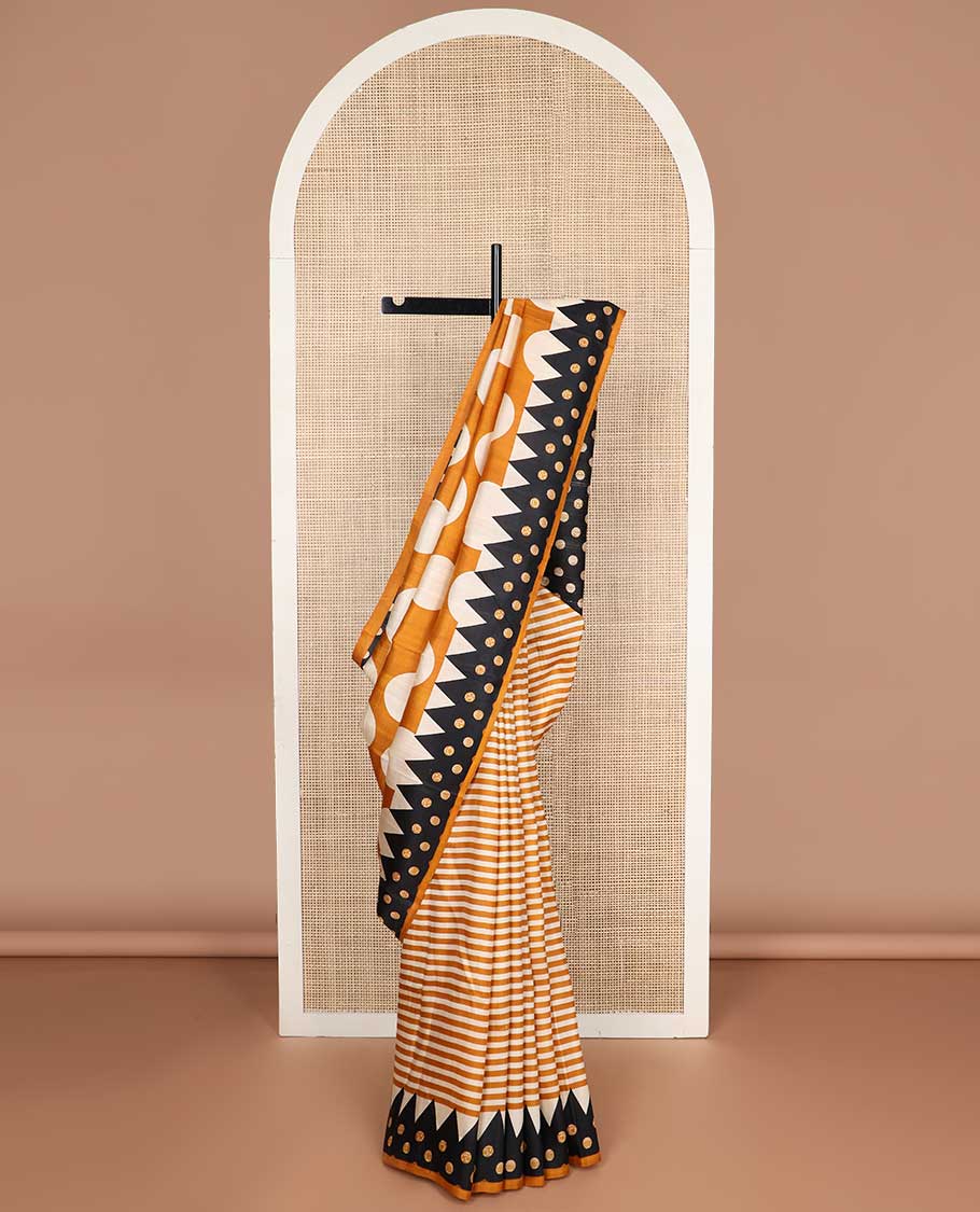 Orange polka dot printed silk saree with contrast temple border & round buttas pallu