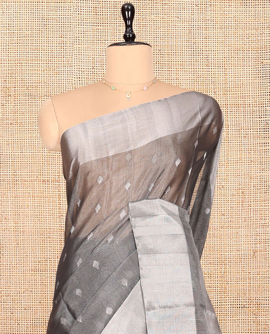 Grey Silk Cotton Saree, Gleamed up with Buttas, a Subtle Bavanji Border, Grand Geometric Patterned Pallu, and a Matching Blouse