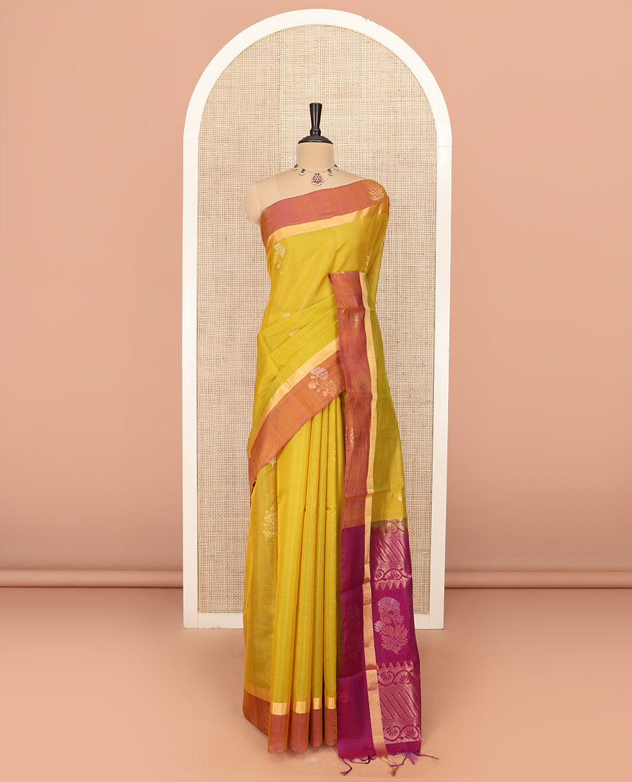 Green Silk Cotton Saree Graced with Floral Buttas All Over the Body, Complemented by a Contrast Floral Zari Motifs Woven Border, Featuring a Contrast Pallu of Floral- Geometric Zari Designs, and Paired with a Contrast Blouse