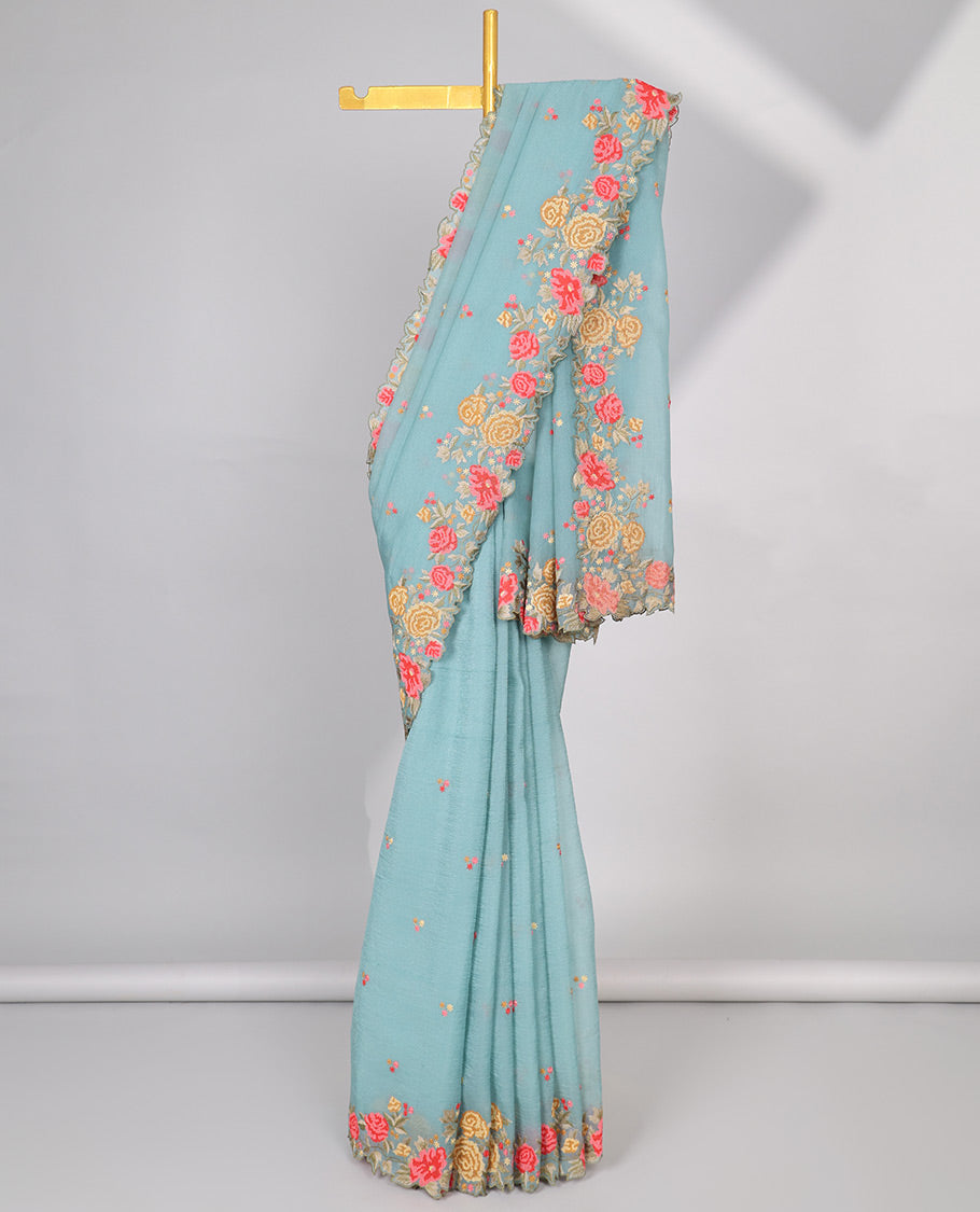 Yellow crushed tissue saree with scallop floral border & motif embroidery pallu
