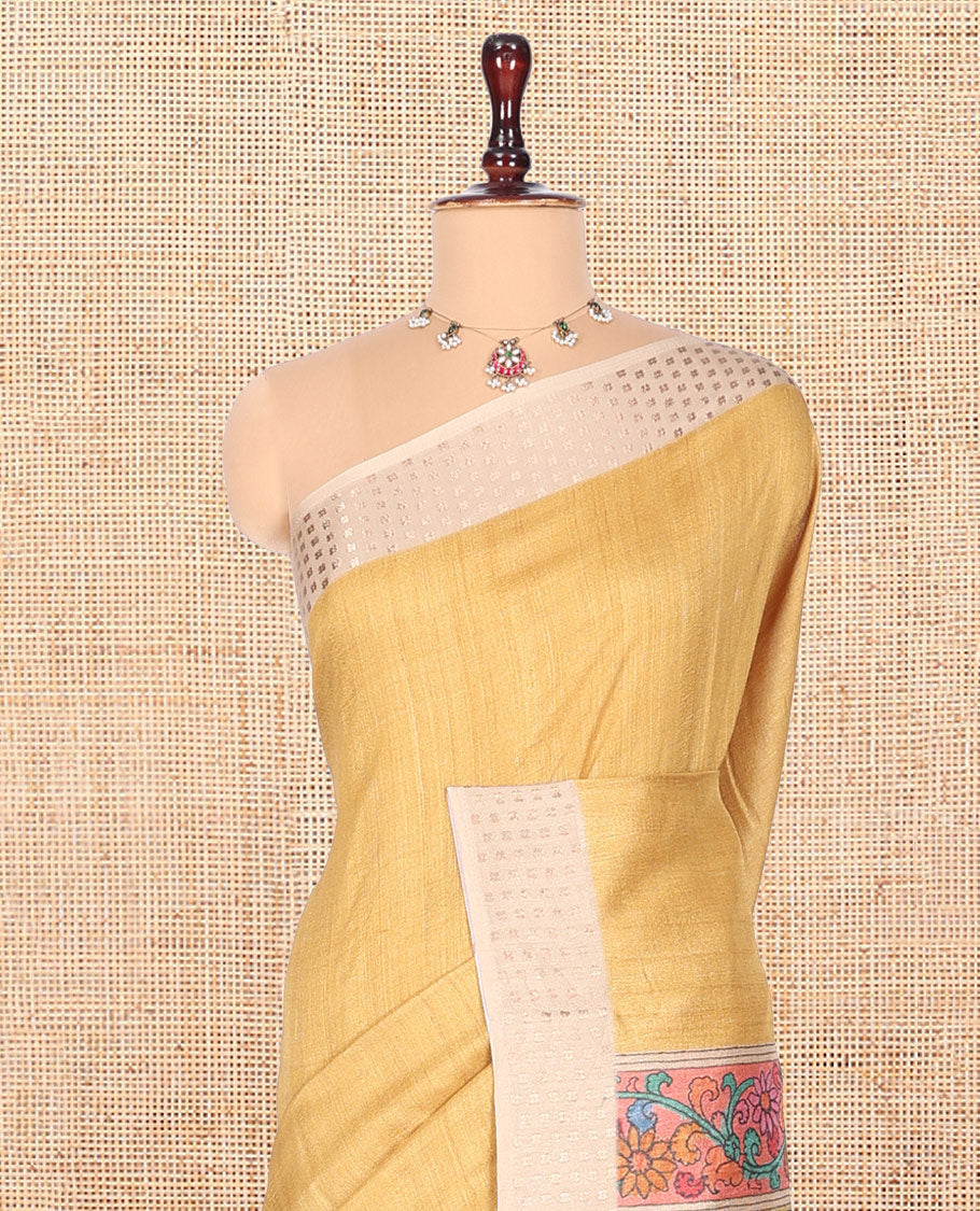 Mustard Plain Fancy Tussar Saree, Complemented by a Contrast Hashtag Motif Border, Kalamkari Flora-Fauna Printed Pallu, and a Contrast Blouse