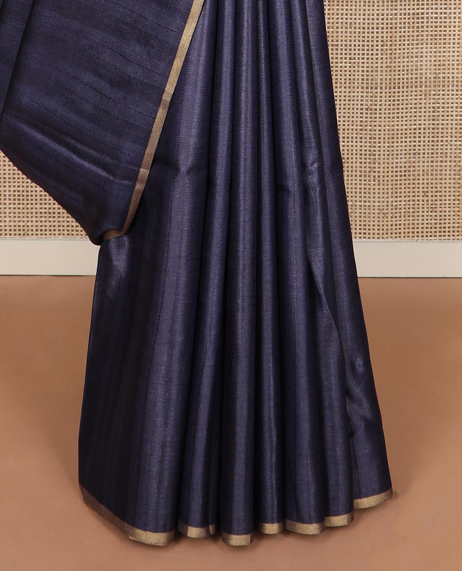 Borderless metallic blue sparsely striped tussar silk saree, striped pallu